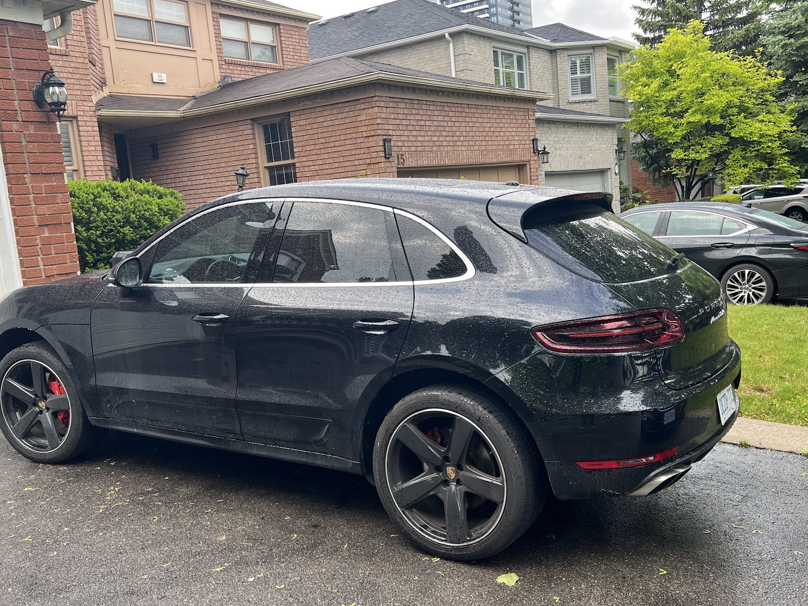 Porsche Macan parked outside the shop
